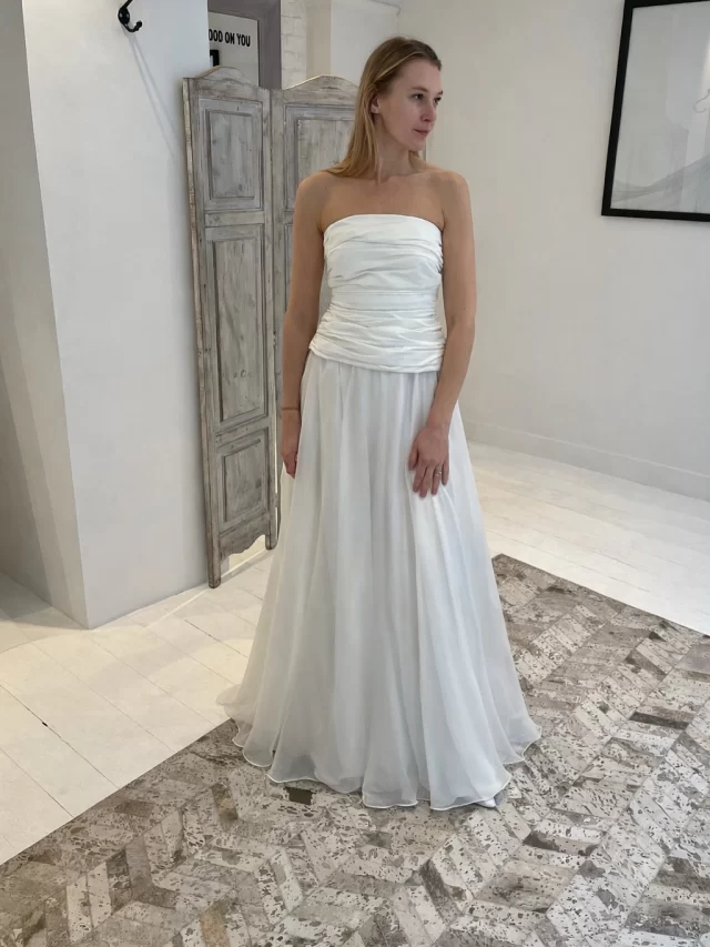 SHADOW & HONEY ➕ Effortless. Ethereal. Unforgettable. 

Meet Honey & Shadow by @donatellegodartparis — the definition of modern romance. A softly ruched bodice paired with a weightless, flowing skirt creates movement that feels as incredible as it looks. Understated, refined, and impossibly chic.

For the bride who wants timeless elegance with a cool-girl edge.

Ready to find your dress? 
Book your private bridal appointment now and fall in love with Honey & Shadow in person.

#DonatelleGodart #ModernBride #BridalStyle #EffortlessBride #BridalBoutique #WeddingDressInspo #BridalAppointments